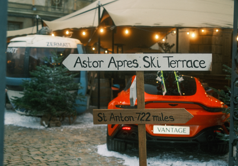 red aston martin and ski terrace signage